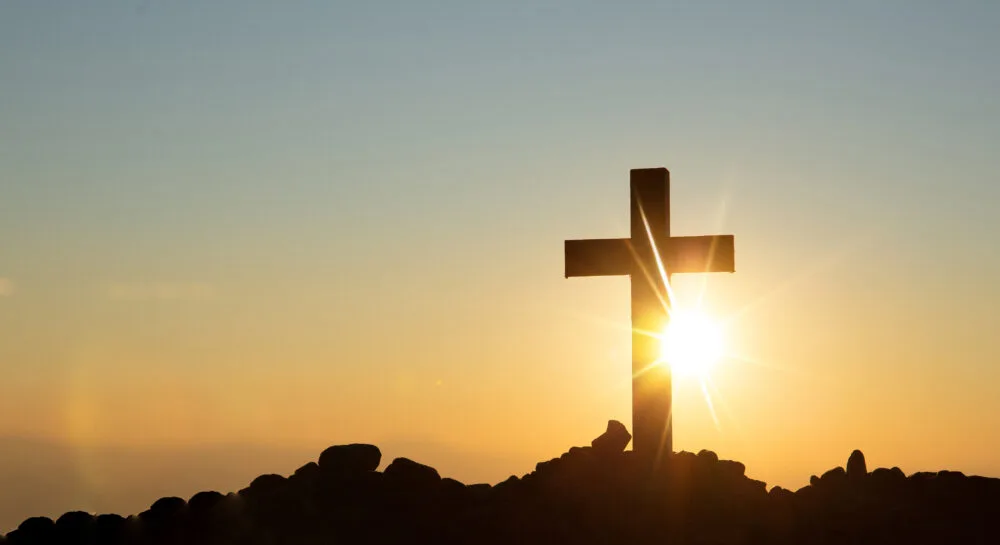 resurrection concept crucifixion jesus christ cross sunset 1000x545 1
